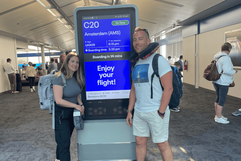 Two people at an airport gate